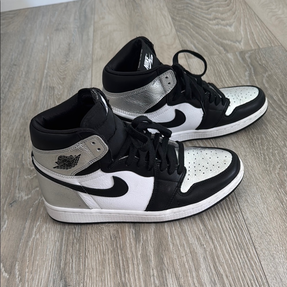 Nike Air Jordan 1 Black and Silver High-Top Sneakers